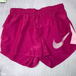 Purple Nike running shorts
